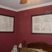 guestroom-with-framed-drawings